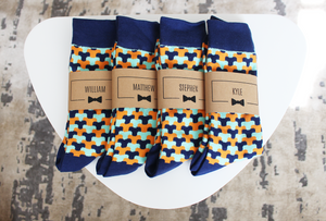 
                  
                    Blue and Orange Funky Groomsmen Socks with Personalized Labels
                  
                
